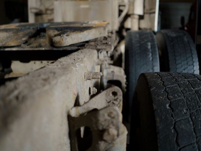 Close-up of a trailer chassis and running gear