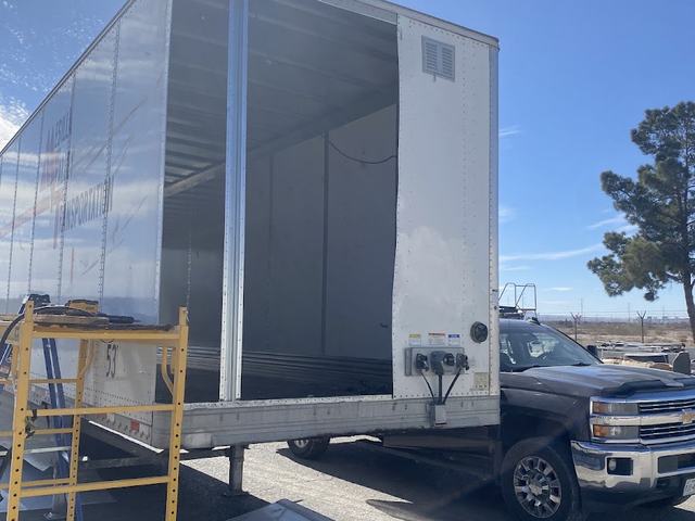 A trailer being worked on at HTT Trailer Repair's yard